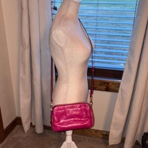 Micheal kors  cross body fushia three compartment bag, bnnu and soft leather.